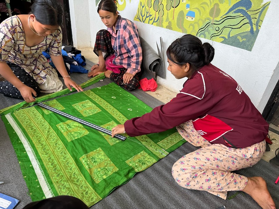 Women learning sewing and tailoring at Nagarjun Learning Center